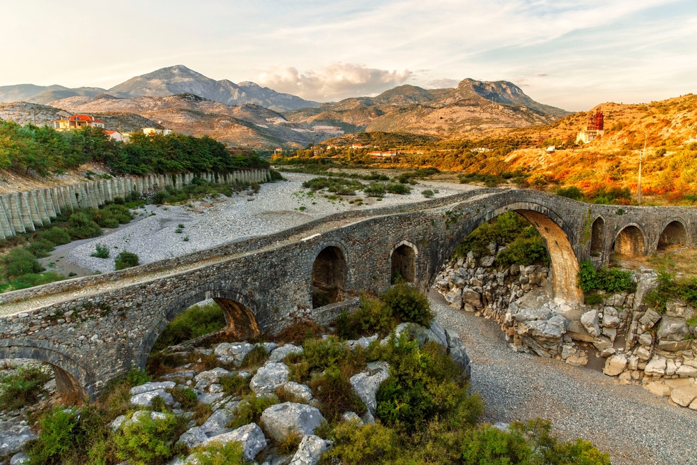 A view of an ancient bridge in Shkoder, Albania - © Guzel Gashigullina/Shutterstock