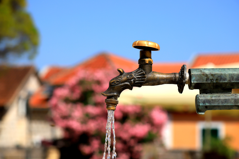 Public drinking fountain in downtown Herzeg Novi, Montenegro - © rospoint / Shutterstock