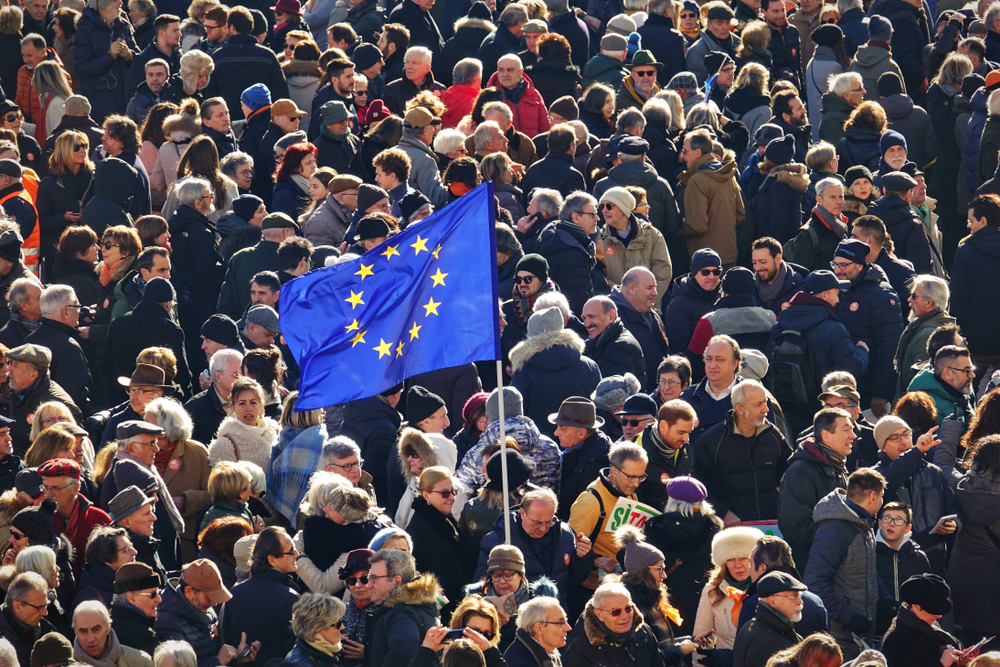 Protesters in Turin in January 2019 carry a European flag - © MikeDotta/Shutterstock