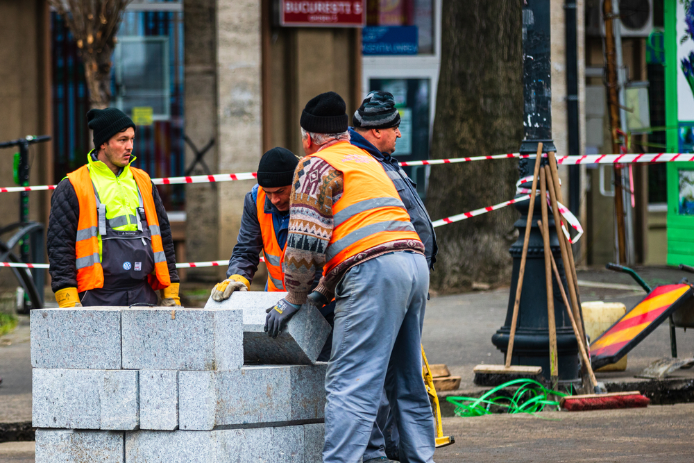 Workers in Bucharest, Romania © Vlad Ispas/Shutterstock Workers in Bucharest, Romania © Vlad Ispas/Shutterstock