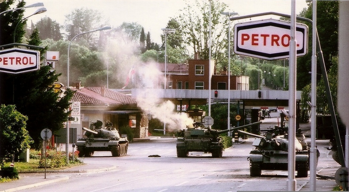 Clashes between the Yugoslav Federal Army and Slovenian Territorial Defense at the border crossing of the "Red House", near Gorizia, following Slovenia's declaration of independence - photo by Peter Bozic - CC BY 3.0, Wikimedia