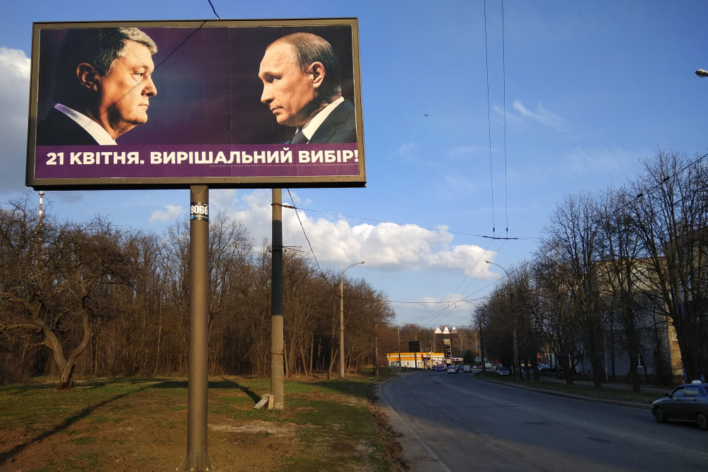 Electoral poster showing former president Poroshenko and Russian president Putin (Photo © aquatarkus/Shutterstock)