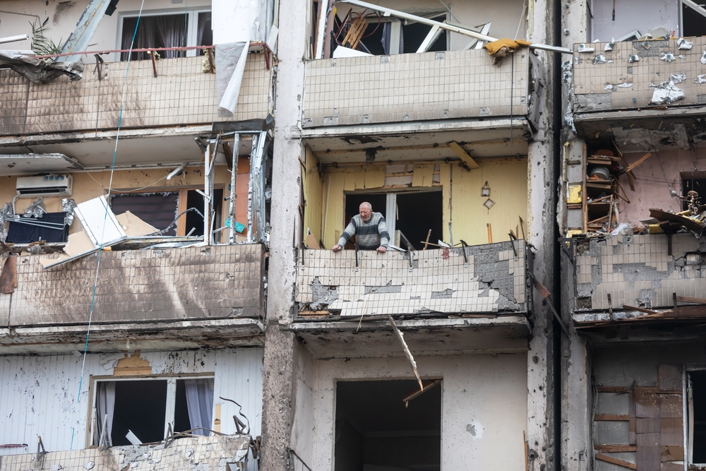 A bombed building in Kyiv, February 25, 2022 - © Drop of Light/Shutterstock