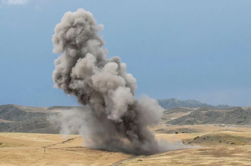 Controlled detonation of landmines and UXO by the HALO Trust close to Askeran, Karabakh © Onnik James Krikorian 2010