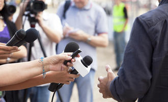 Journalists at work - © wellphoto/Shutterstock