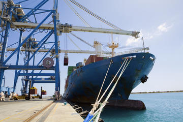 Cargo ship at dock in Limassol Cyprus © sirtravelalot/Shutterstock