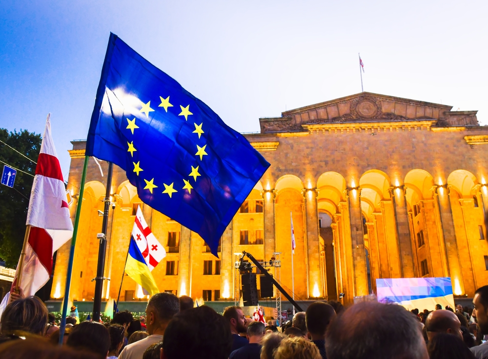 Tbilisi, Georgia - 20th June, 2022: People by georgian parliament on major EU-pro rally event © EvaL Miko/Shutterstock