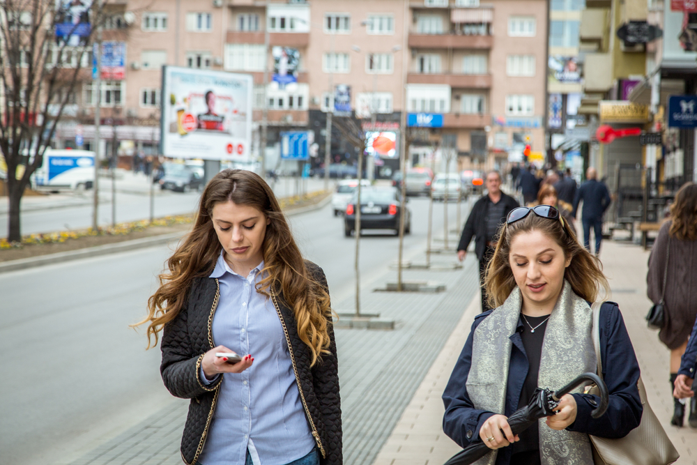 Two girls in Pristina (© JulianBuijzen/Shutterstock)