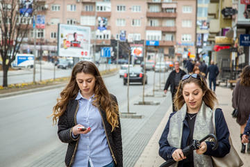 Two girls in Pristina (© JulianBuijzen/Shutterstock)