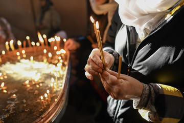 Ethnic Armenians celebrate Christmas on 6 January 2024 at one of the Apostolic Churches, St. Etchmiadzin, in Tbilisi.© Onnik James krikorian/OBCT