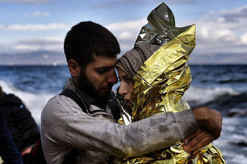 Coppia siriana arrivata a Lesbo, foto di Jordi Bernabeu Farrus - Flickr.com.jpg