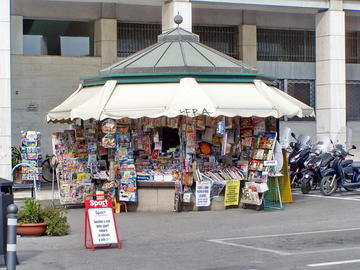 Newsstand selling magazines © Angela N Perryman Shutterstock