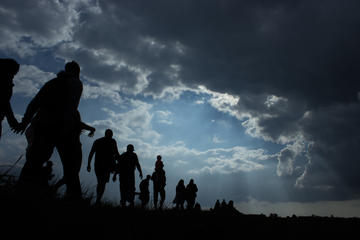 Persone che migrano (JK21/Shutterstock) Persone che migrano (JK21/Shutterstock)