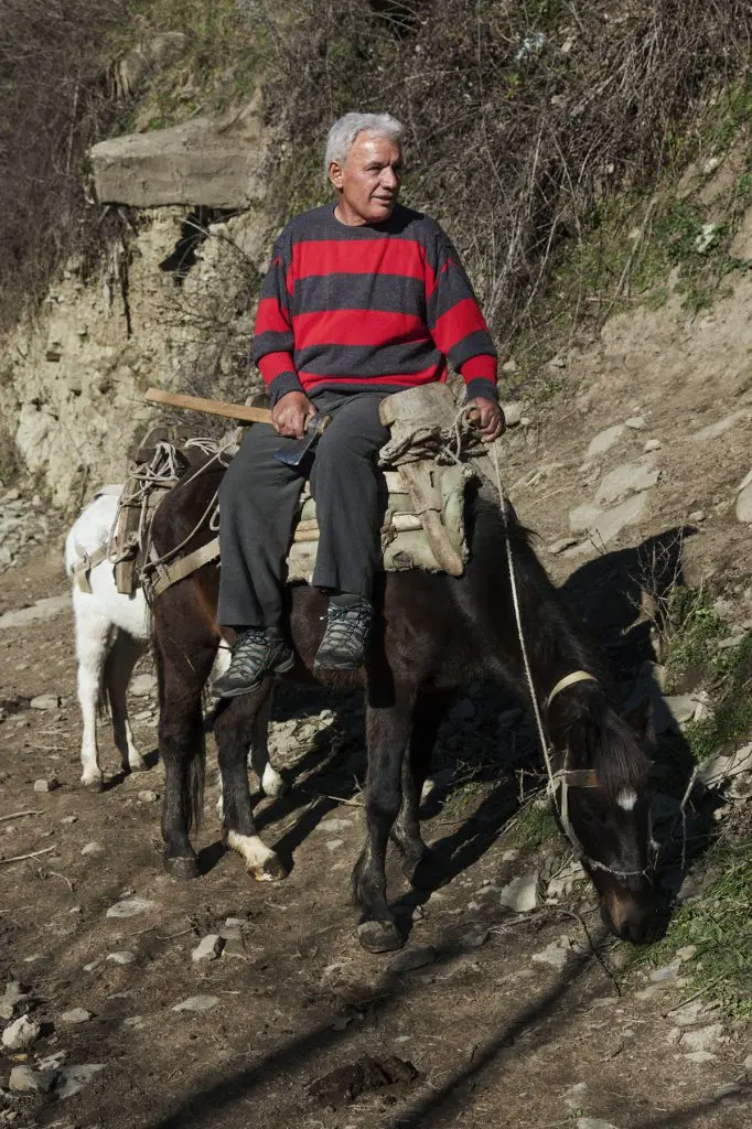 Shahin Mehmeti on his mule Shahin Mehmeti on his mule