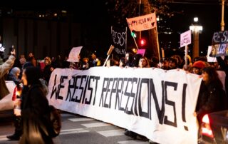 Tbilisi, Georgia, Durante una manifestazione del 2024 © Valeria Petrova/Shutterstock